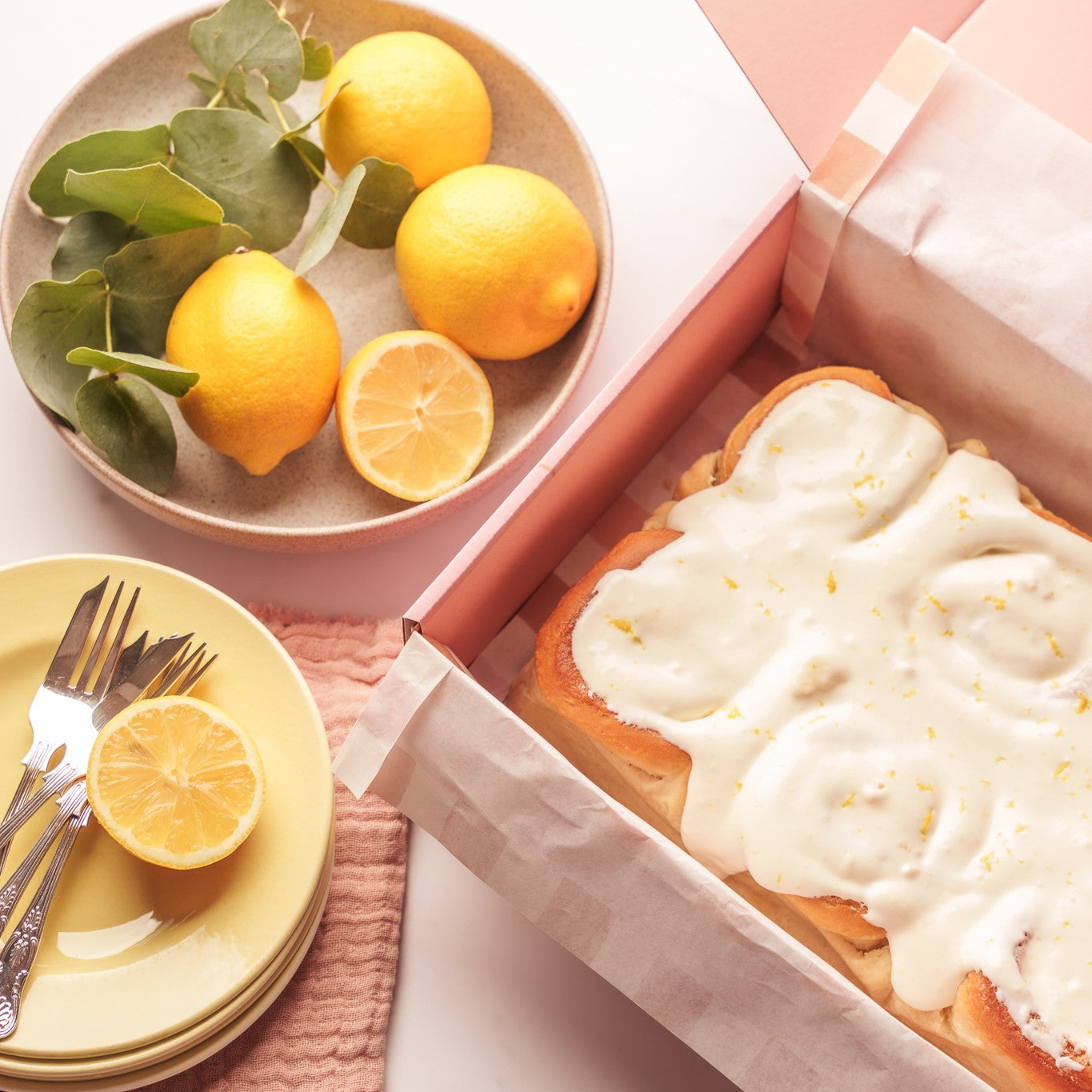 Lemon Drizzle Buns next to Gift box